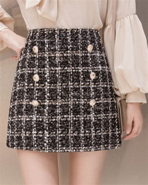 black chanel style skirt|Chanel poofy skirt.